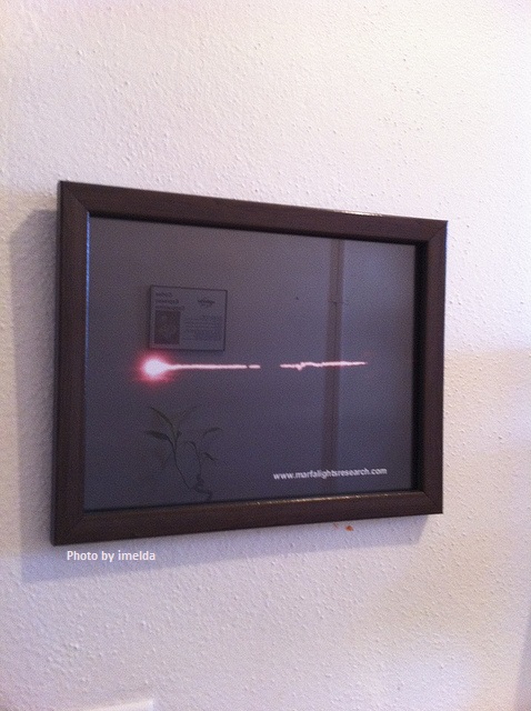 Photo by imelda of a photograph of a CE-III flying Marfa Light